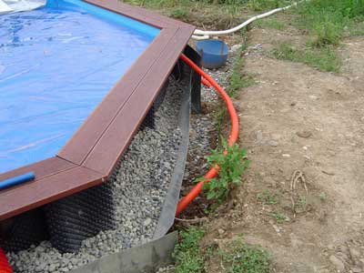 piscine-bois-enterree-geotextile-remblai-protection